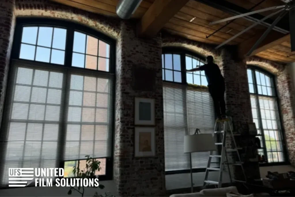 Decorative window film installation on large windows.