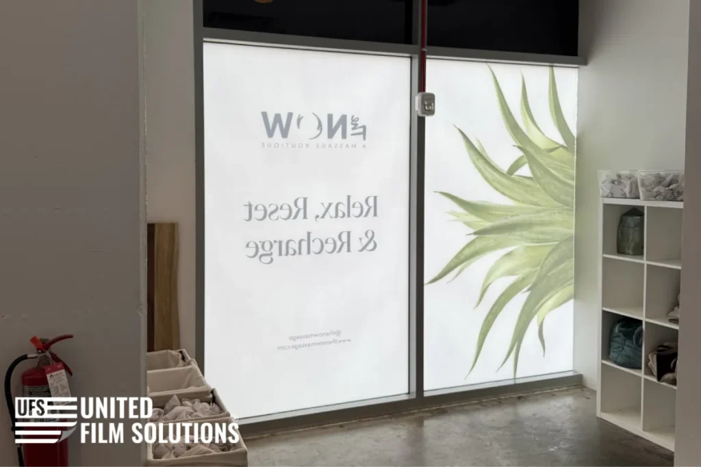 Frosted window vinyl and decals installed on commercial glass.